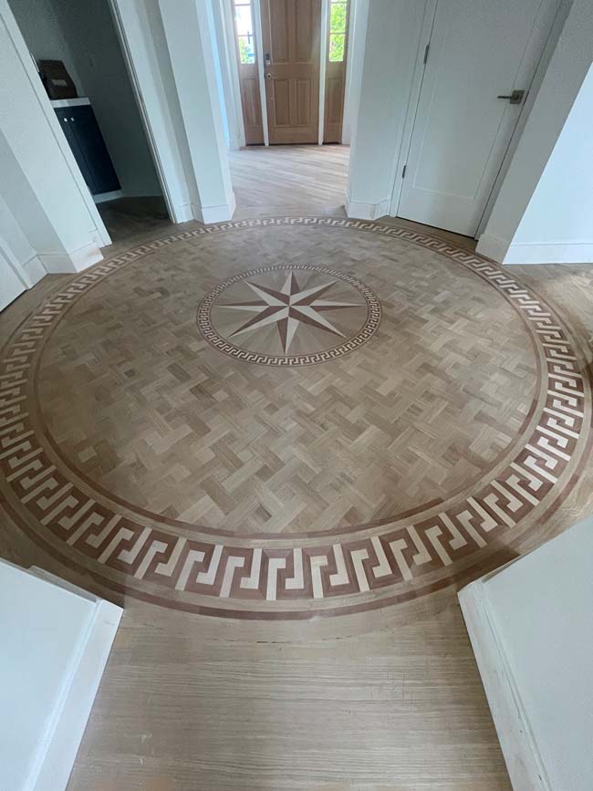 684: Rotunda floor with custom curved Greek Key border, PC7 wood medallion and basket weave parquet M21