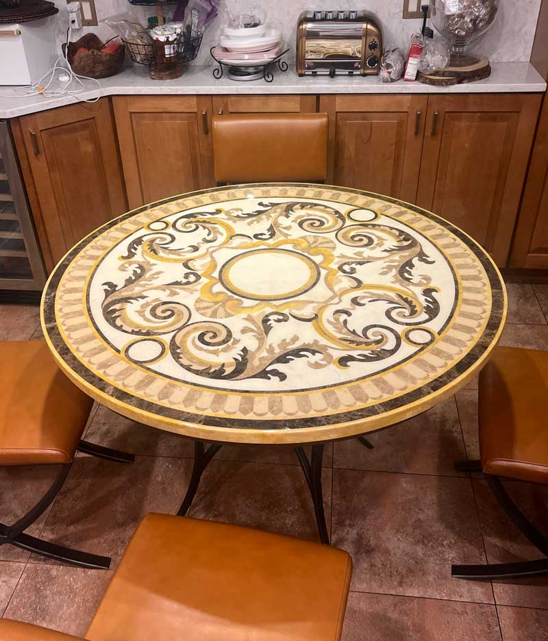 Marble tabletop glued on top of existing old wood table.