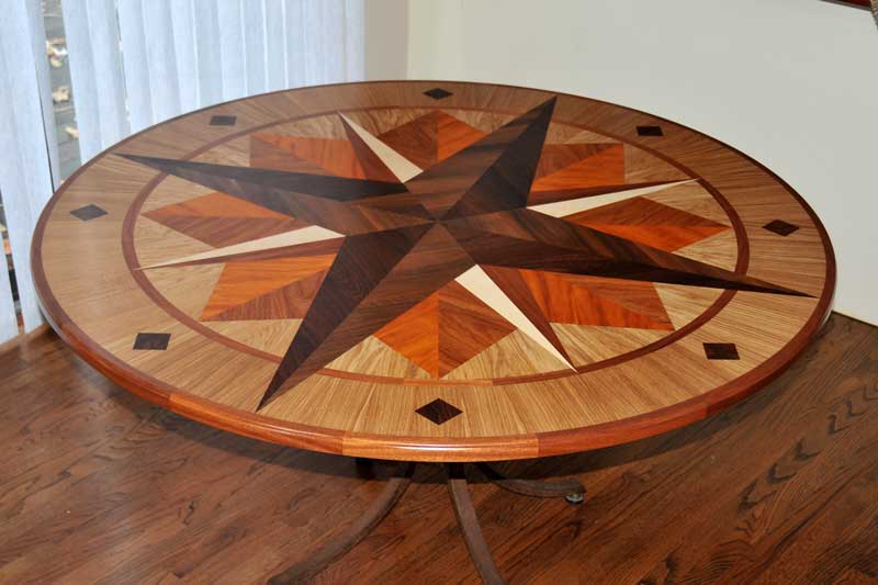 50 inch diameter table with solid wood edging.