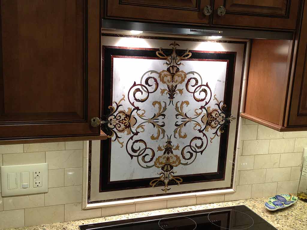 Garden III marble medallion backsplash framed with marble pencils
