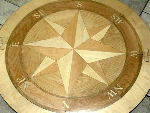 77: Unfinished Compass Rose. The medallion is inside the installation template.