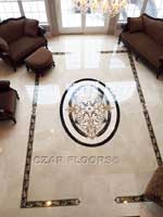 ID:465; Custom scaled marble border and oval medallion in Crema Marfill background tiles